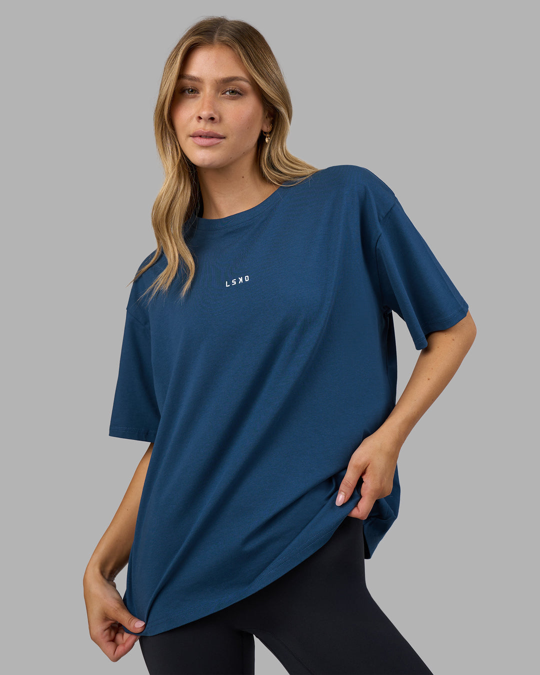 Woman wearing Go-To FLXCotton Oversized Tee - Indigo-White | Model:Leilani | Size:XS - view 1