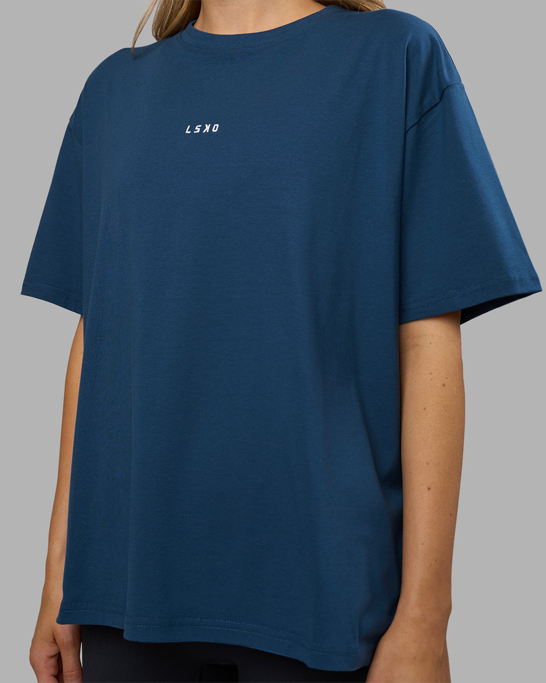 Woman wearing Go-To FLXCotton Oversized Tee - Indigo-White | Model:Leilani | Size:XS - view 5