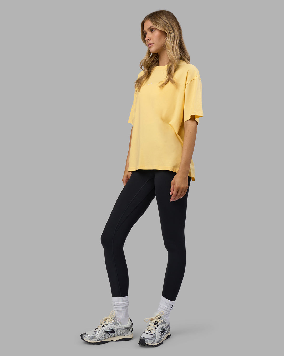 Woman wearing Go-To FLXCotton Oversized Tee - Lemon-White | Model:Leilani | Size:XS - view 5