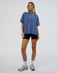 Woman wearing Go-To FLXCotton Oversized Tee - Midnight Blue Washed-White | Model:Leilani | Size:XS | Thumbnail Index: 1