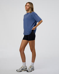 Woman wearing Go-To FLXCotton Oversized Tee - Midnight Blue Washed-White | Model:Leilani | Size:XS | Thumbnail Index: 3