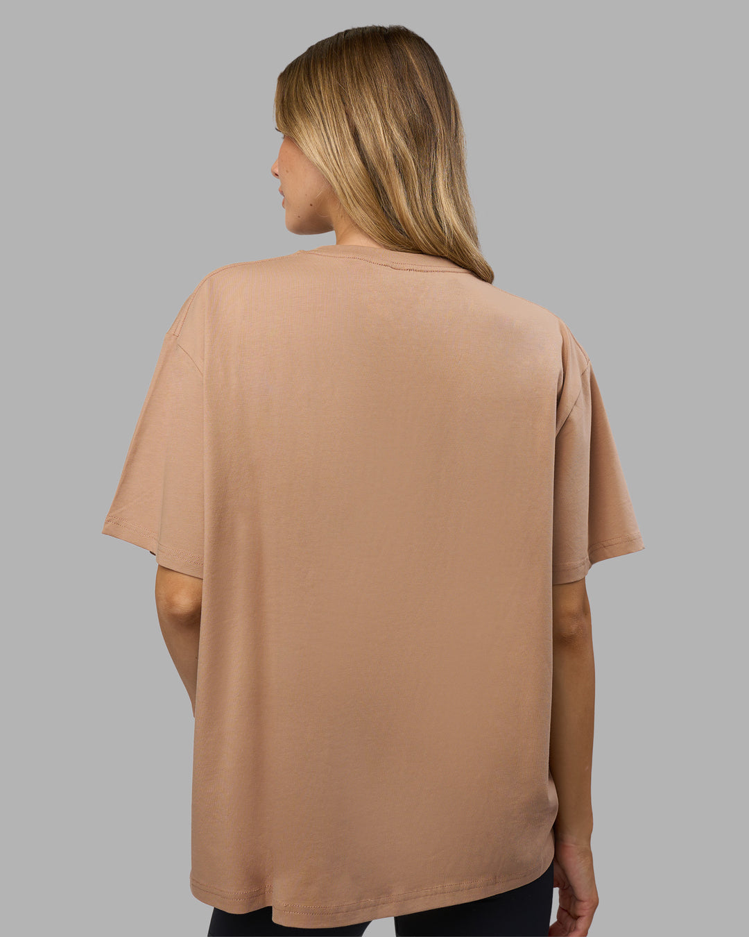 Woman wearing Go-To FLXCotton Oversized Tee - Warm Smoke-White | Model:Leilani | Size:XS - view 5