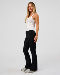 Woman wearing Go-To FLXCotton Scoop Neck Tank in White-Black | Model:Issy | Size:XS | Thumbnail Index: 9