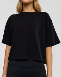 Woman wearing Go-To FLXCotton Skimmer Tee - Black-Black | Model:Leilani | Size:XS | Thumbnail Index: 4