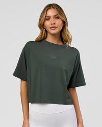 Woman wearing Go-To FLXCotton Skimmer Tee - Carbon Green-Carbon Green | Model:Leilani | Size:XS | Thumbnail Index: 0