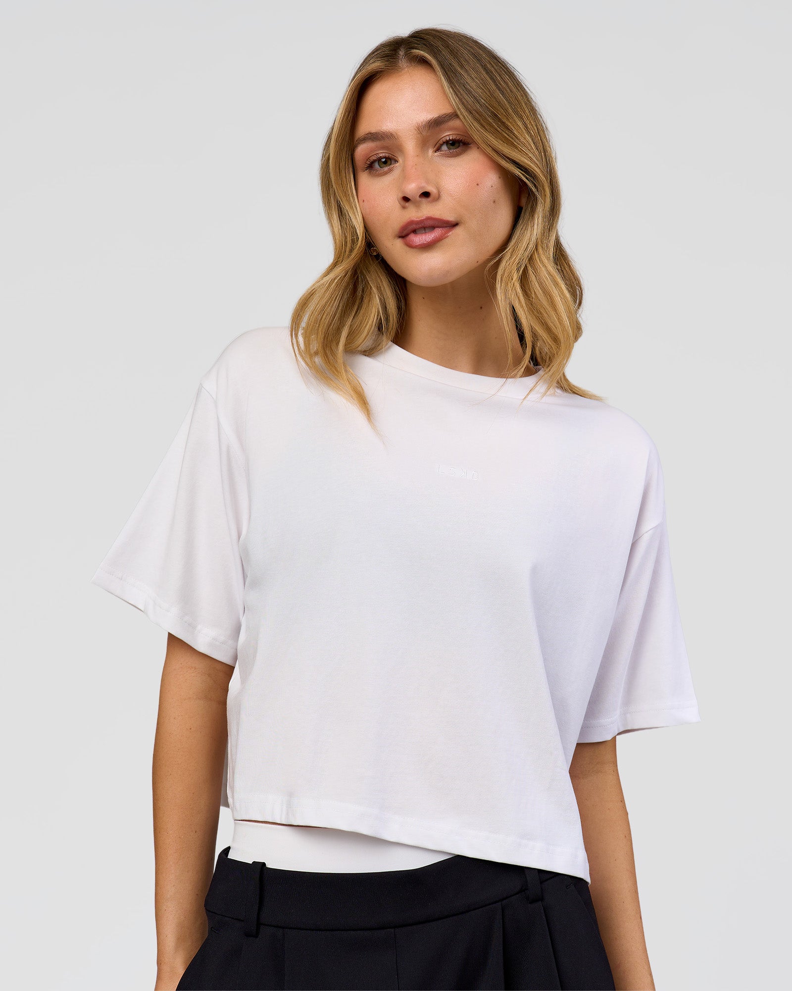 Woman wearing Go-To FLXCotton Skimmer Tee - White-White | Model:Leilani | Size:XS