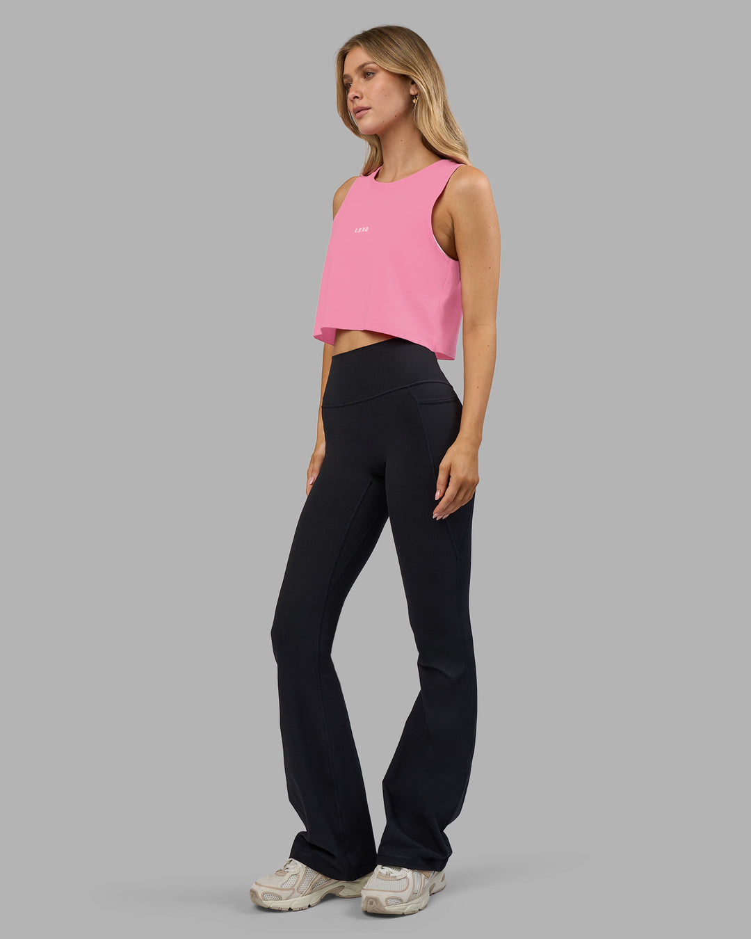 Woman wearing Go-To FLXCotton Tank - Candy Pink-White | Model:Leilani | Size:XS - view 5