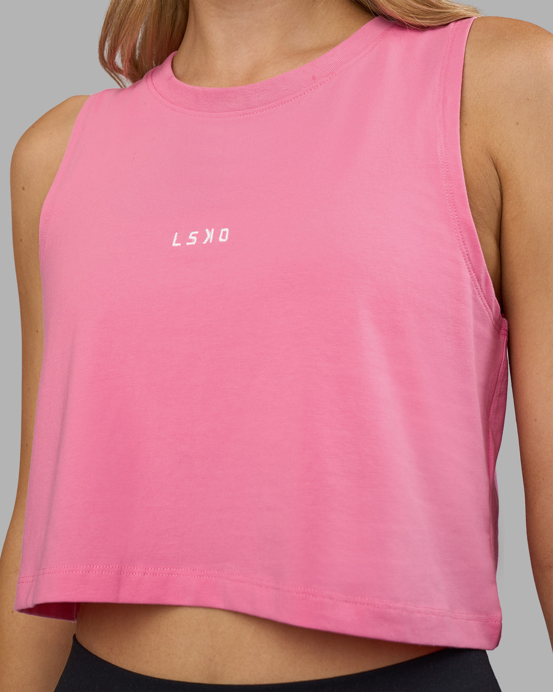 Woman wearing Go-To FLXCotton Tank - Candy Pink-White | Model:Leilani | Size:XS - view 4