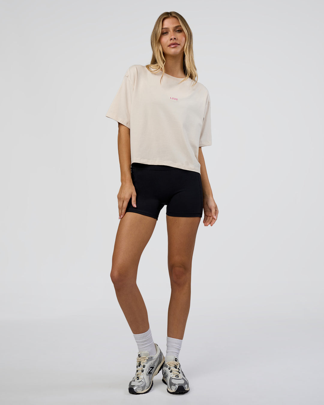 Woman wearing Go-To Heavy Weight FLXCotton Graphic Skimmer Tee - Off White-Multi | Model:Leilani | Size:XS - view 5
