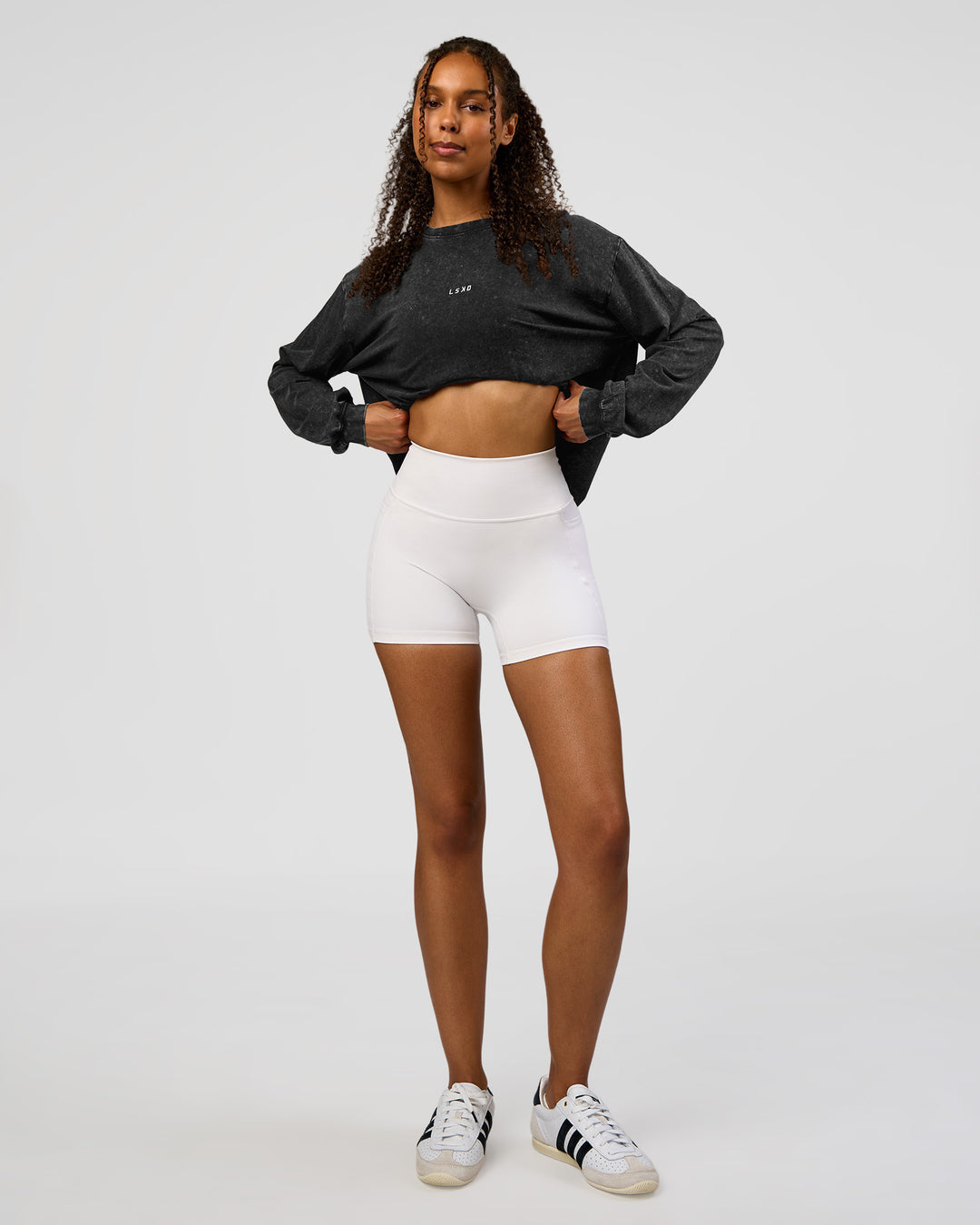 Woman wearing Go-To Long Sleeve FLXCotton Oversized Tee - Black Washed-White | Model:Jordan | SIze:XS - view 3