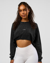 Woman wearing Go-To Long Sleeve FLXCotton Oversized Tee - Black Washed-White | Model:Jordan | SIze:XS | Thumbnail Index: 0