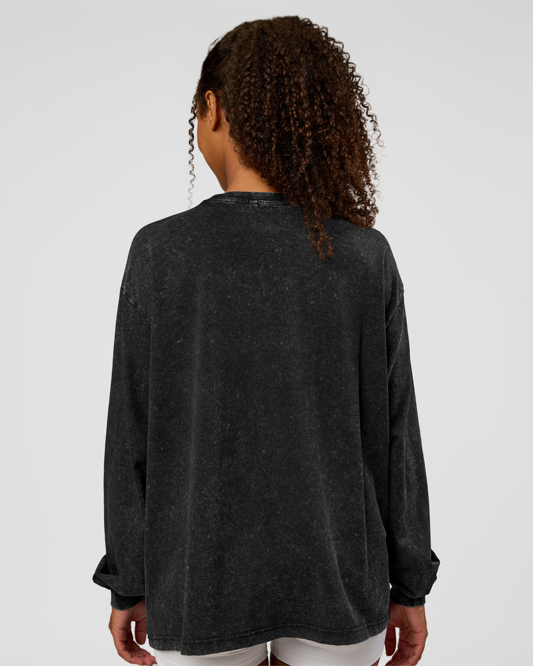 Woman wearing Go-To Long Sleeve FLXCotton Oversized Tee - Black Washed-White | Model:Jordan | SIze:XS - view 2