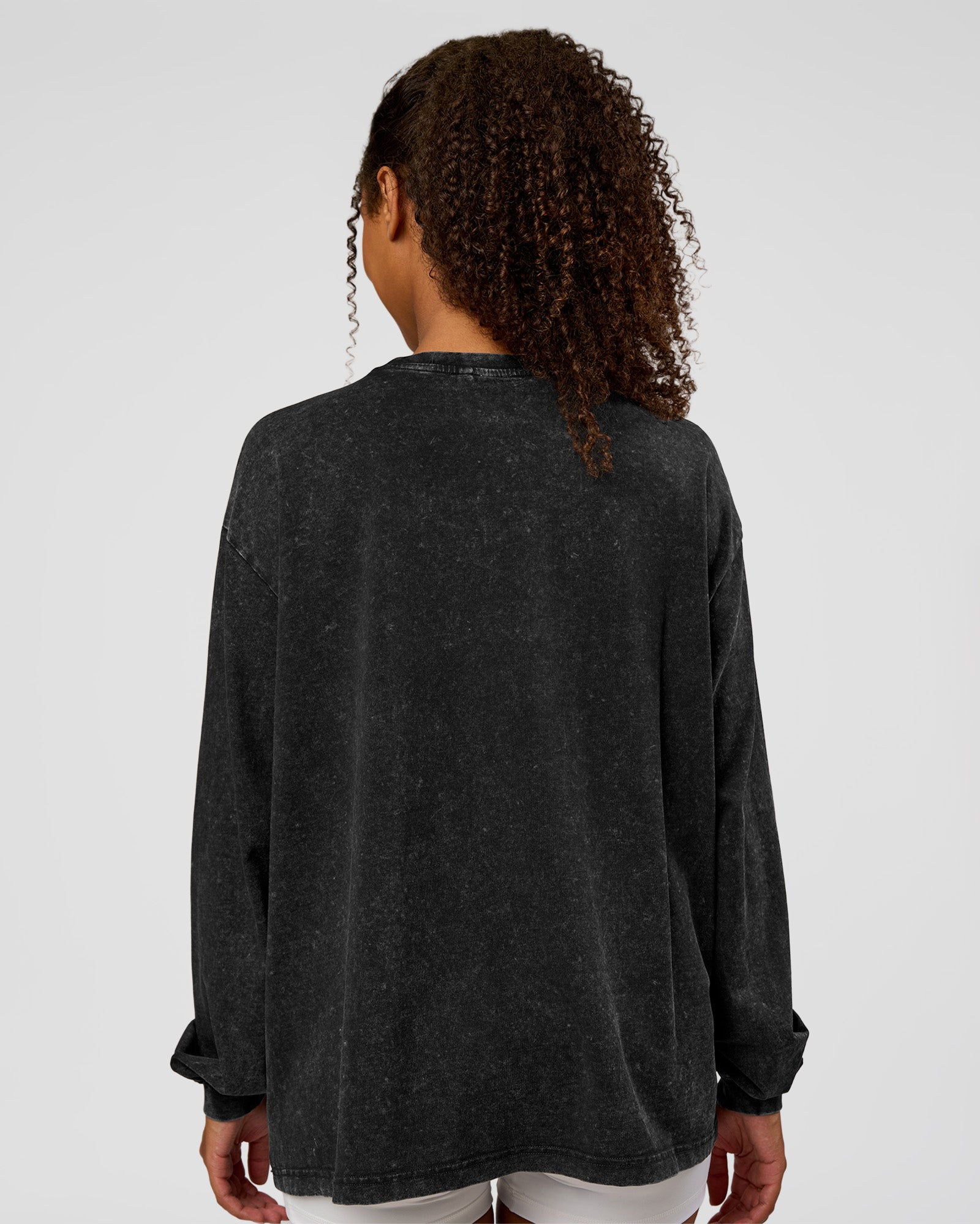 Woman wearing Go-To Long Sleeve FLXCotton Oversized Tee - Black Washed-White | Model:Jordan | SIze:XS