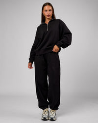 Woman wearing Go-To Oversized Quarter Zip Sweater - Black | Model:Brylee | Size:XS | Thumbnail Index: 6