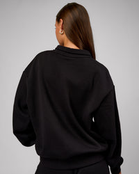 Woman wearing Go-To Oversized Quarter Zip Sweater - Black | Model:Brylee | Size:XS | Thumbnail Index: 3