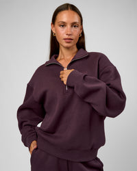 Woman wearing Go-To Oversized Quarter Zip Sweater - Midnight Plum | Model:Brylee | Size:XS | Thumbnail Index: 2