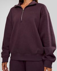 Woman wearing Go-To Oversized Quarter Zip Sweater - Midnight Plum | Model:Brylee | Size:XS | Thumbnail Index: 7