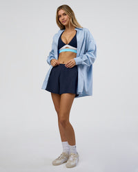 Woman wearing Go-To Oversized Shirt - Poplin Blue | Model:Leilani | Size:XS | Thumbnail Index: 9