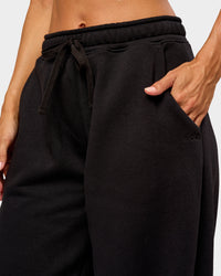 Woman wearing Go-To Oversized Track Pant - Black | Model:Brylee | Size:XS | Thumbnail Index: 2