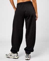 Woman wearing Go-To Oversized Track Pant - Black | Model:Brylee | Size:XS | Thumbnail Index: 3