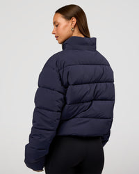 Woman wearing Go-To Puffer Jacket - Future Navy | Model:Brylee | Size:XS | Thumbnail Index: 7