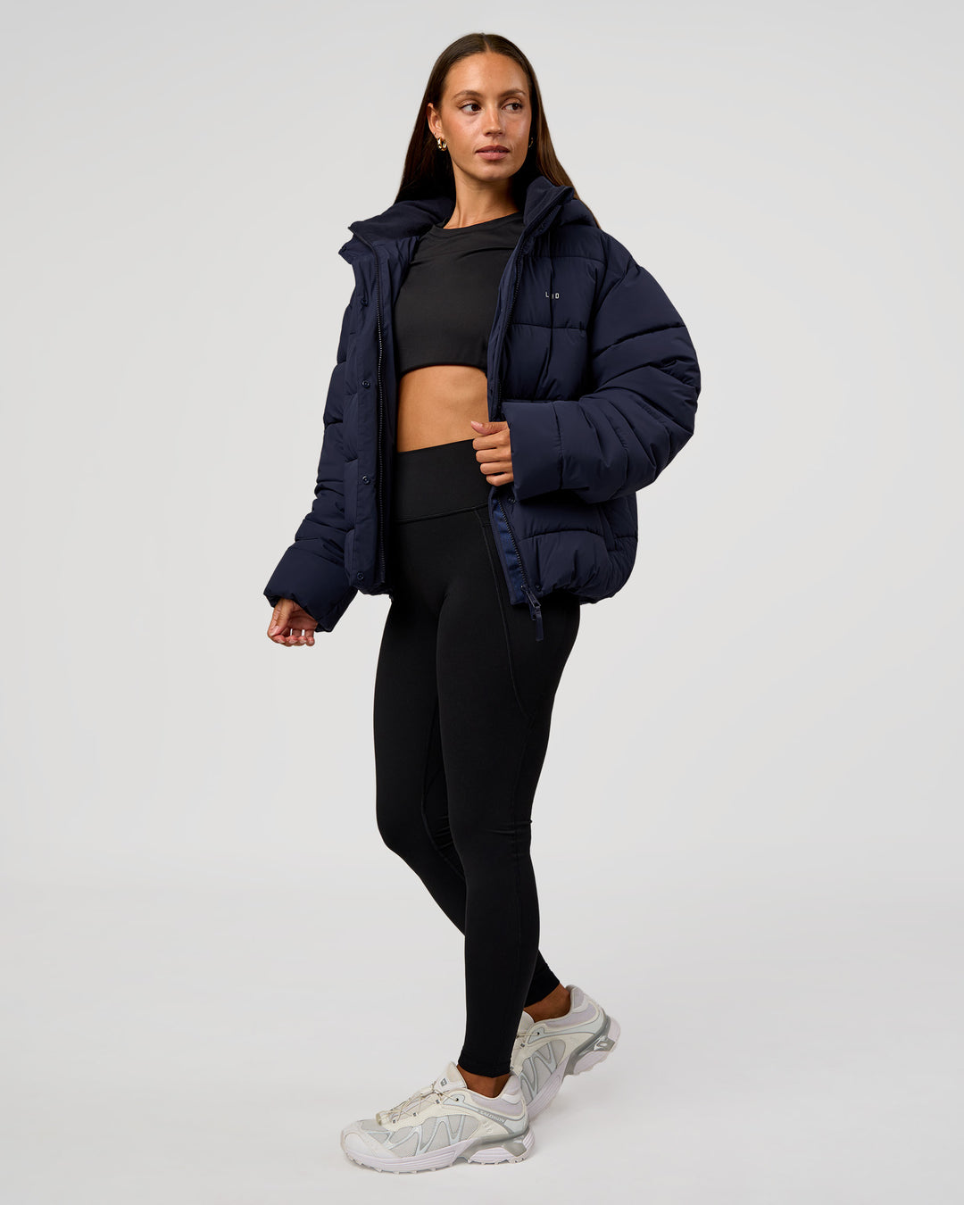 Woman wearing Go-To Puffer Jacket - Future Navy | Model:Brylee | Size:XS - view 7