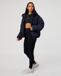 Woman wearing Go-To Puffer Jacket - Future Navy | Model:Brylee | Size:XS | Thumbnail Index: 6