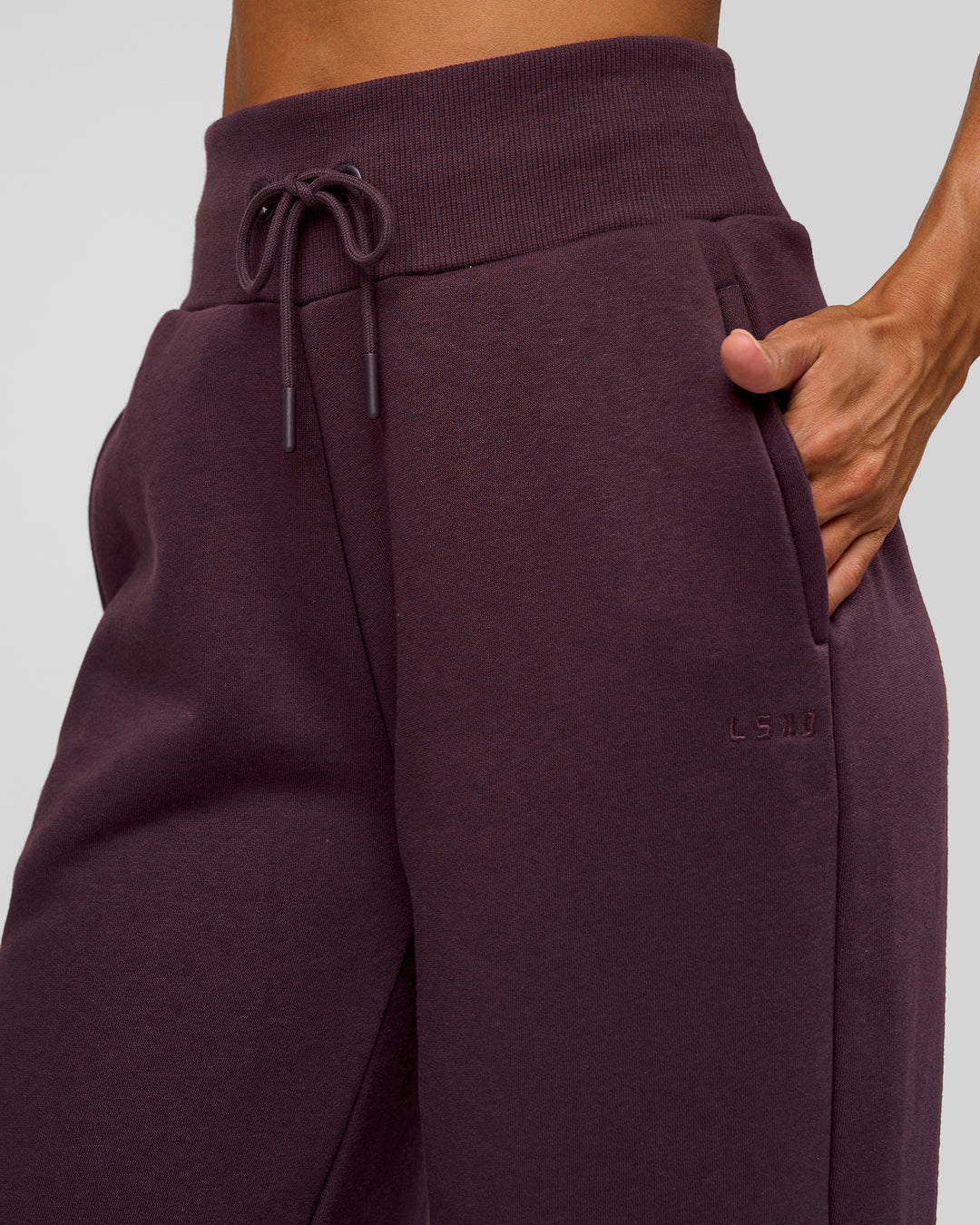 Woman wearing Go-To Wide Leg Track Pant - Midnight Plum | Model:Rhiley | Size:XS - view 9