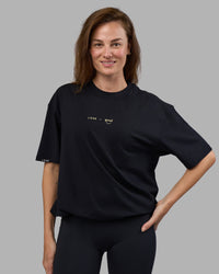Woman wearing Good Human Factory Vol 2 FLXCotton Oversize Tee - Black | Size:XS | Thumbnail Index: 4