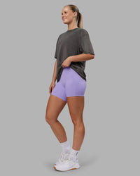 Woman wearing Heart FLXCotton Oversized Tee - Washed Dark Storm-Violet Ray | Model:Neve | Size:XS | Thumbnail Index: 10