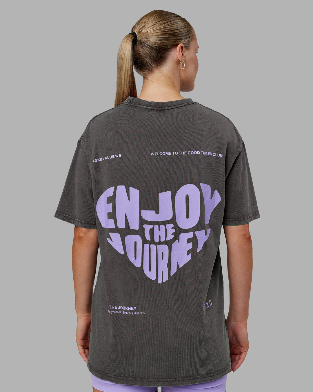 Woman wearing Heart FLXCotton Oversized Tee - Washed Dark Storm-Violet Ray | Model:Neve | Size:XS - view 7