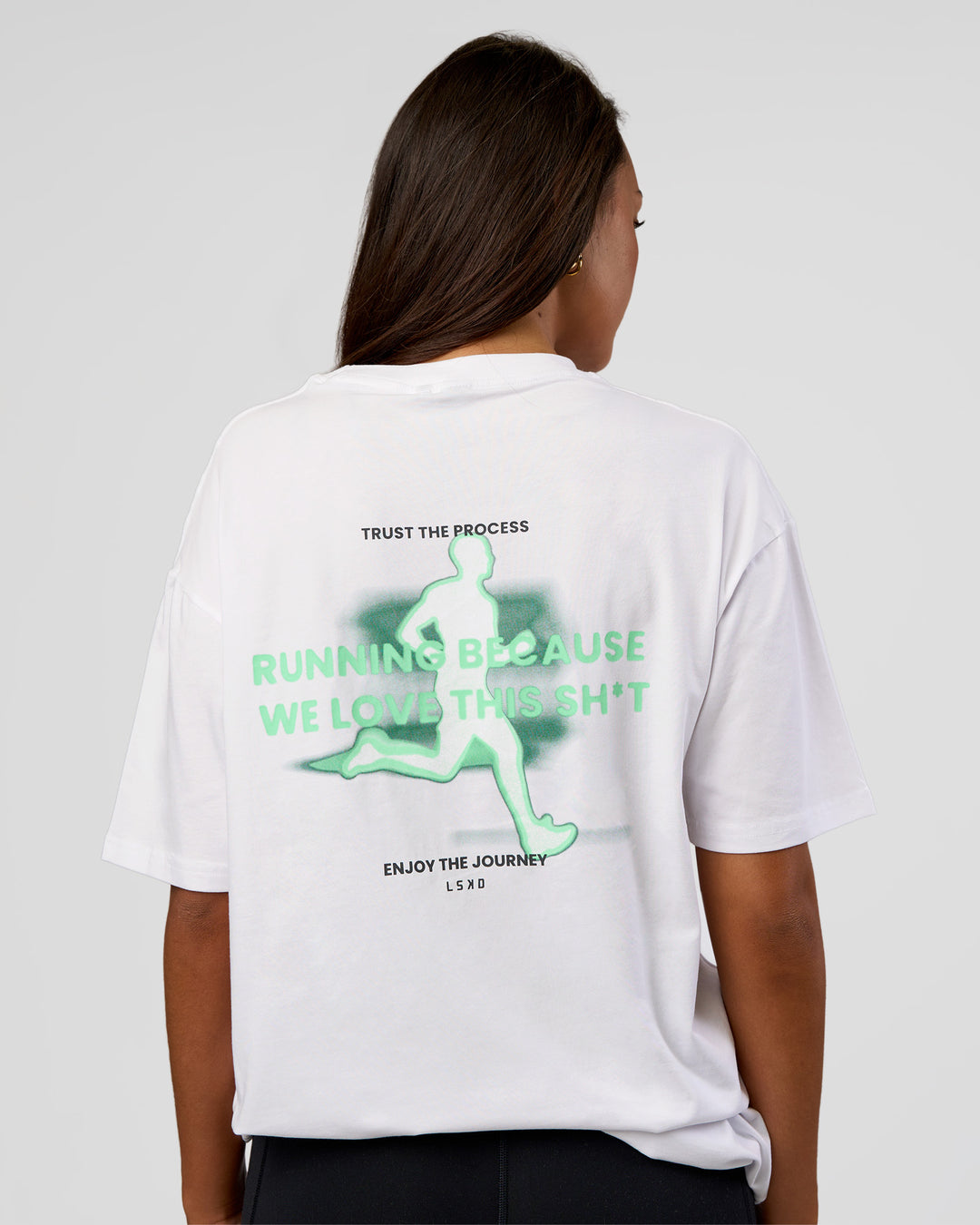Woman wearing High Run FLXCotton Oversized Tee - White-Jelly Mint | Model:Kirstyn | Size:XS - view 4