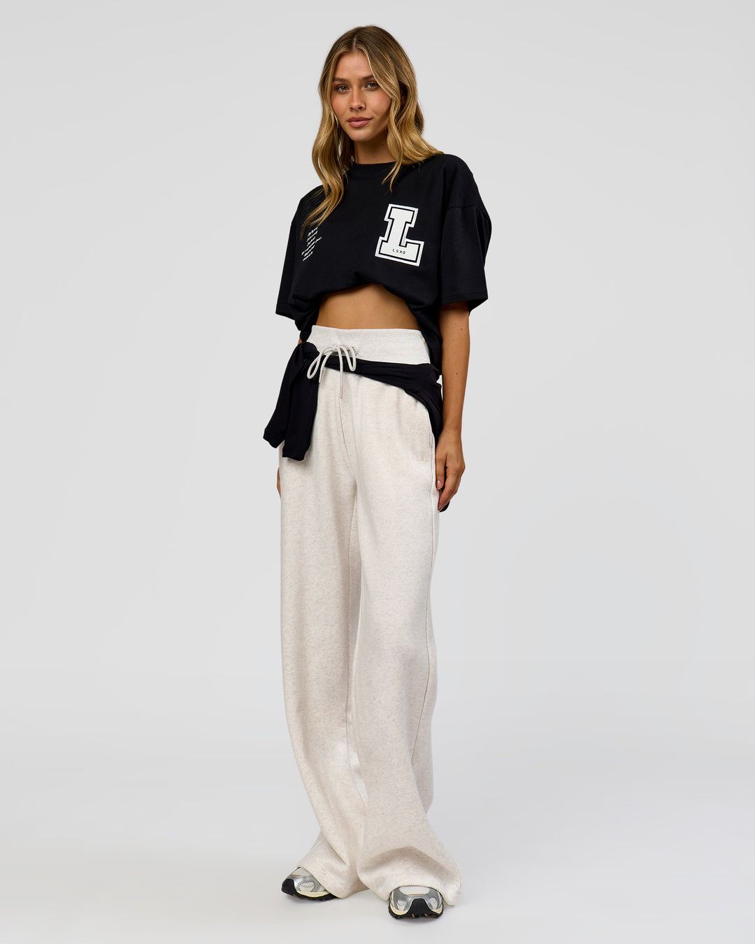Woman wearing Hype Heavyweight Unisex Oversized Tee - Black-White | Model:Leilani | Size:XS - view 25