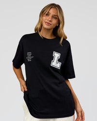 Woman wearing Hype Heavyweight Unisex Oversized Tee - Black-White | Model:Leilani | Size:XS | Thumbnail Index: 16