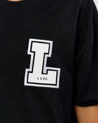 Woman wearing Hype Heavyweight Unisex Oversized Tee - Black-White | Model:Leilani | Size:XS | Thumbnail Index: 18