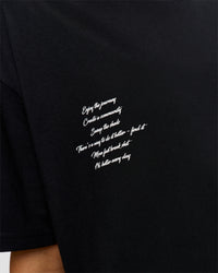 Woman wearing Hype Heavyweight Unisex Oversized Tee - Black-White | Model:Leilani | Size:XS | Thumbnail Index: 19