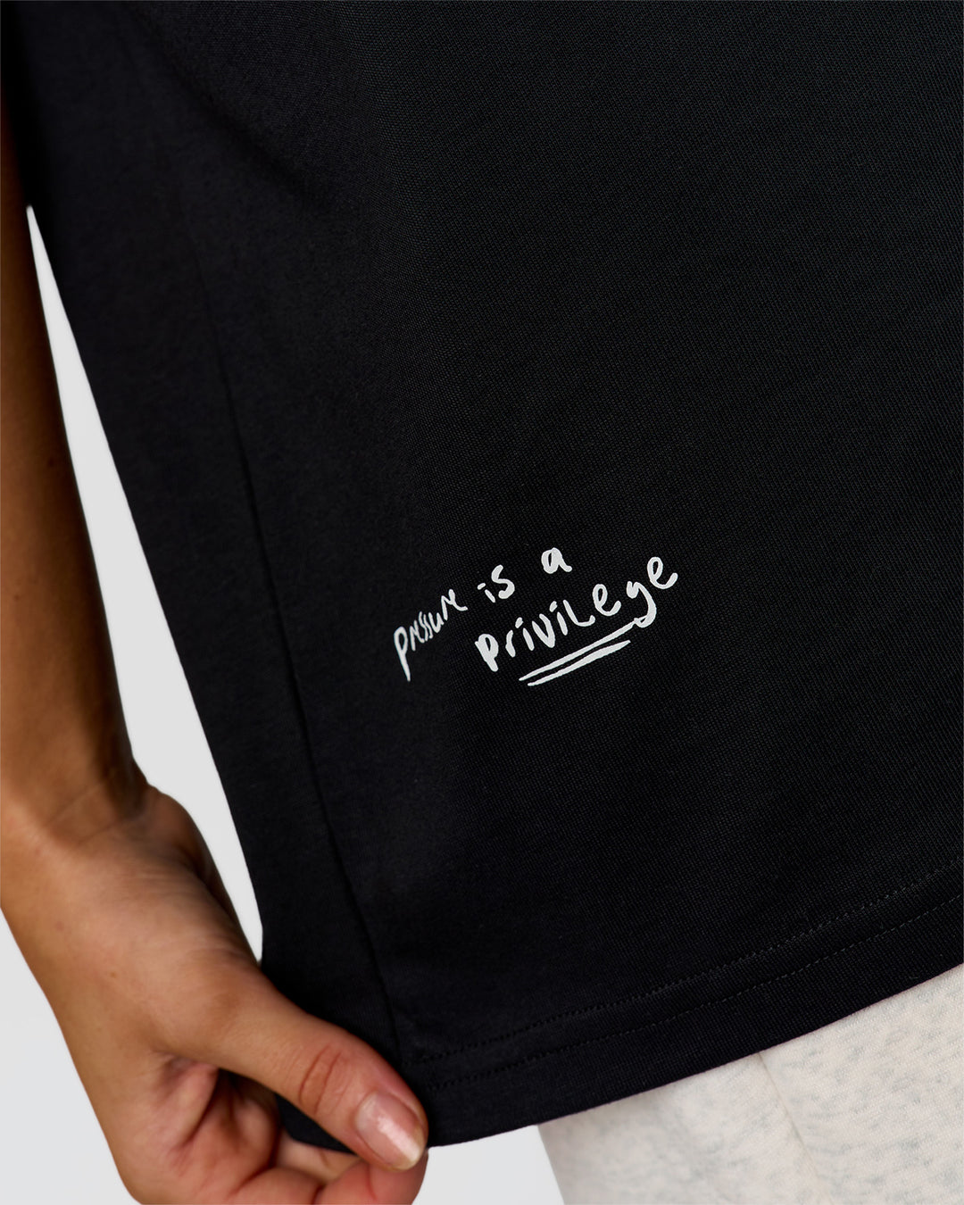 Woman wearing Hype Heavyweight Unisex Oversized Tee - Black-White | Model:Leilani | Size:XS - view 21