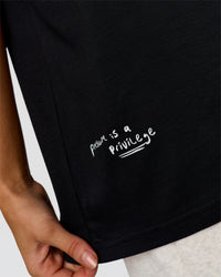 Woman wearing Hype Heavyweight Unisex Oversized Tee - Black-White | Model:Leilani | Size:XS | Thumbnail Index: 20