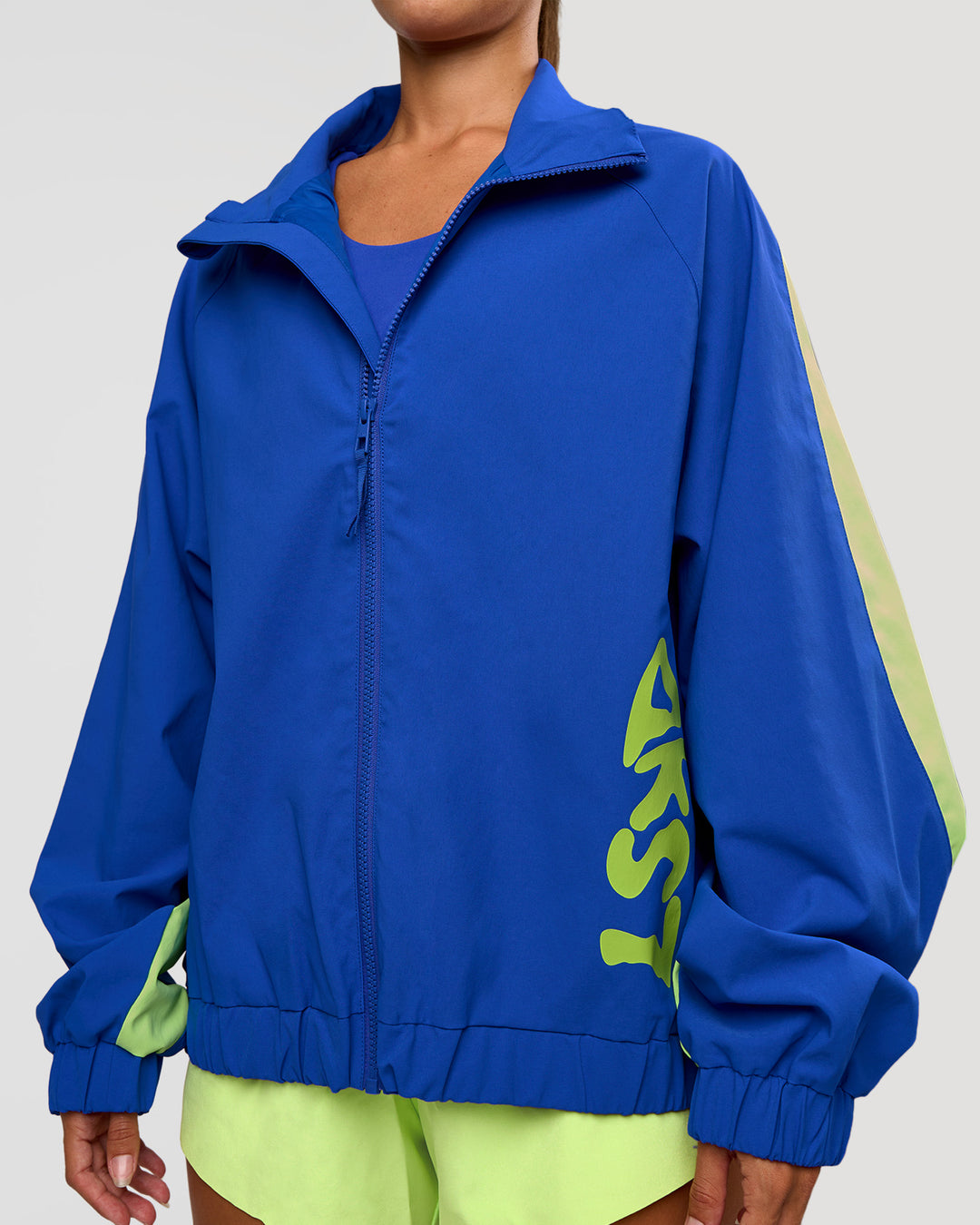 Woman wearing Hype Oversized Track Jacket - Electric Indigo | Model:Brylee | Size:XS - view 11