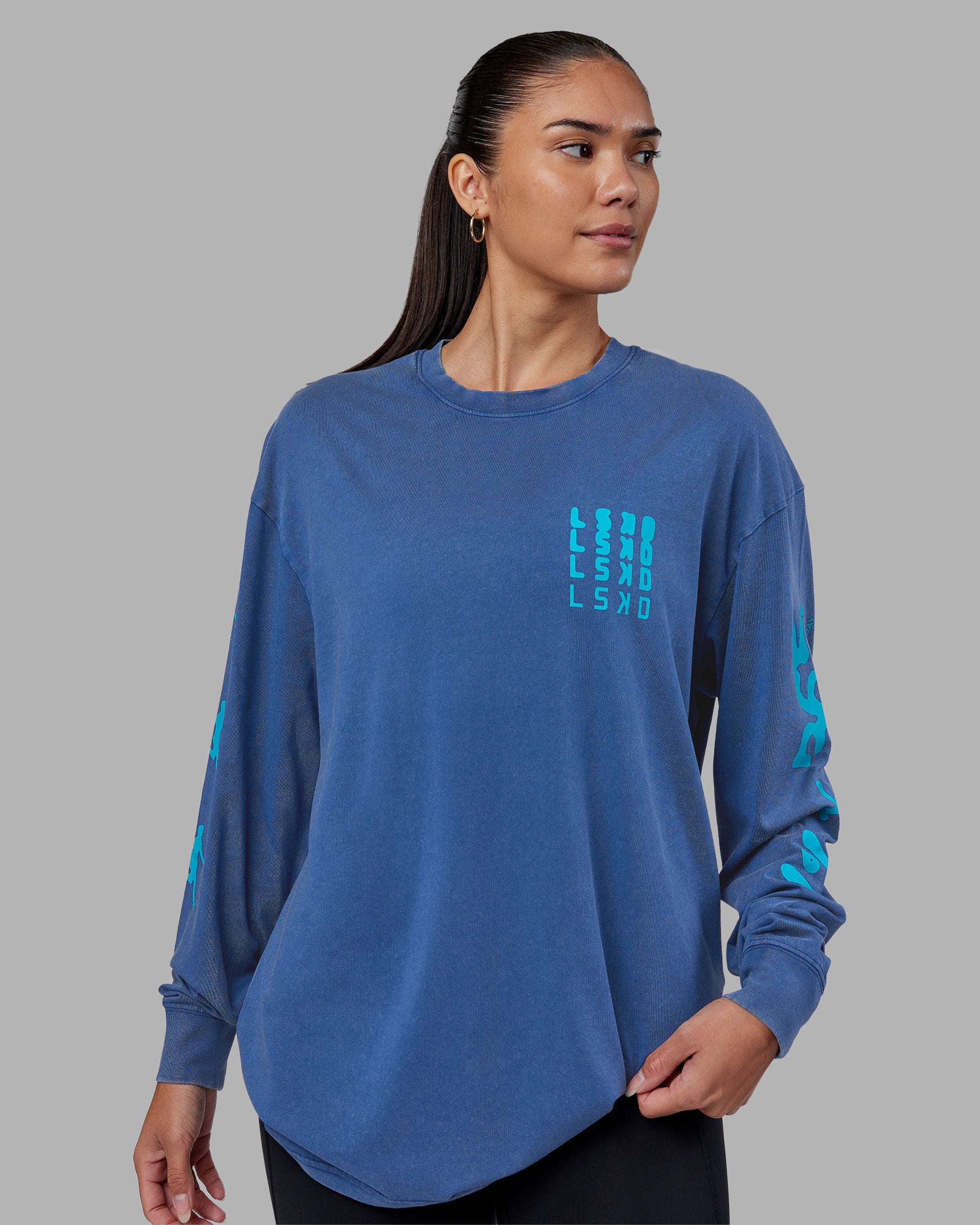 Woman wearing Inferno Journey FLXCotton Oversized Long Sleeve Tee - Midnight Blue-Blue Bird | Model:Rhiley | Size:XS