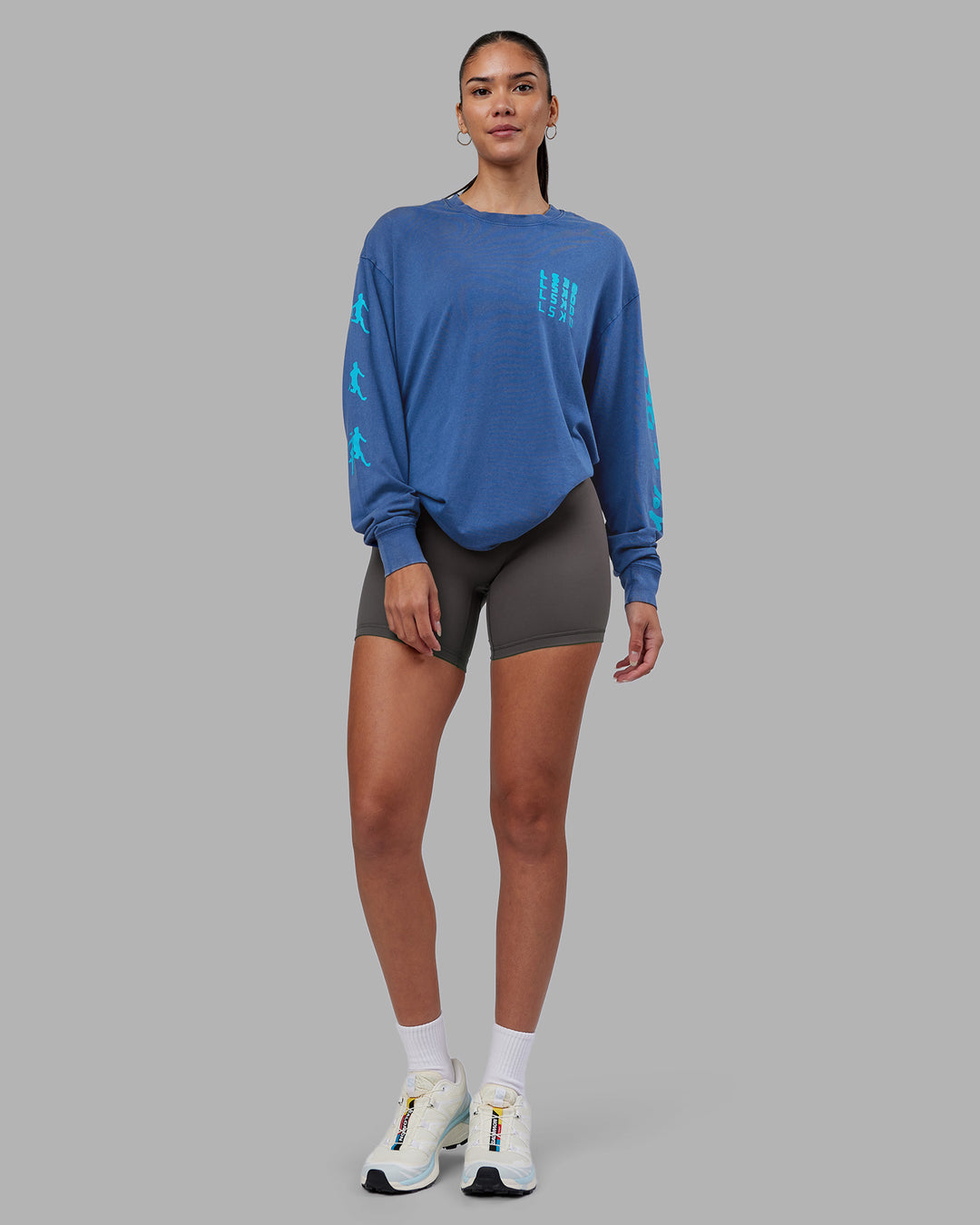 Woman wearing Inferno Journey FLXCotton Oversized Long Sleeve Tee - Midnight Blue-Blue Bird | Model:Rhiley | Size:XS - view 12