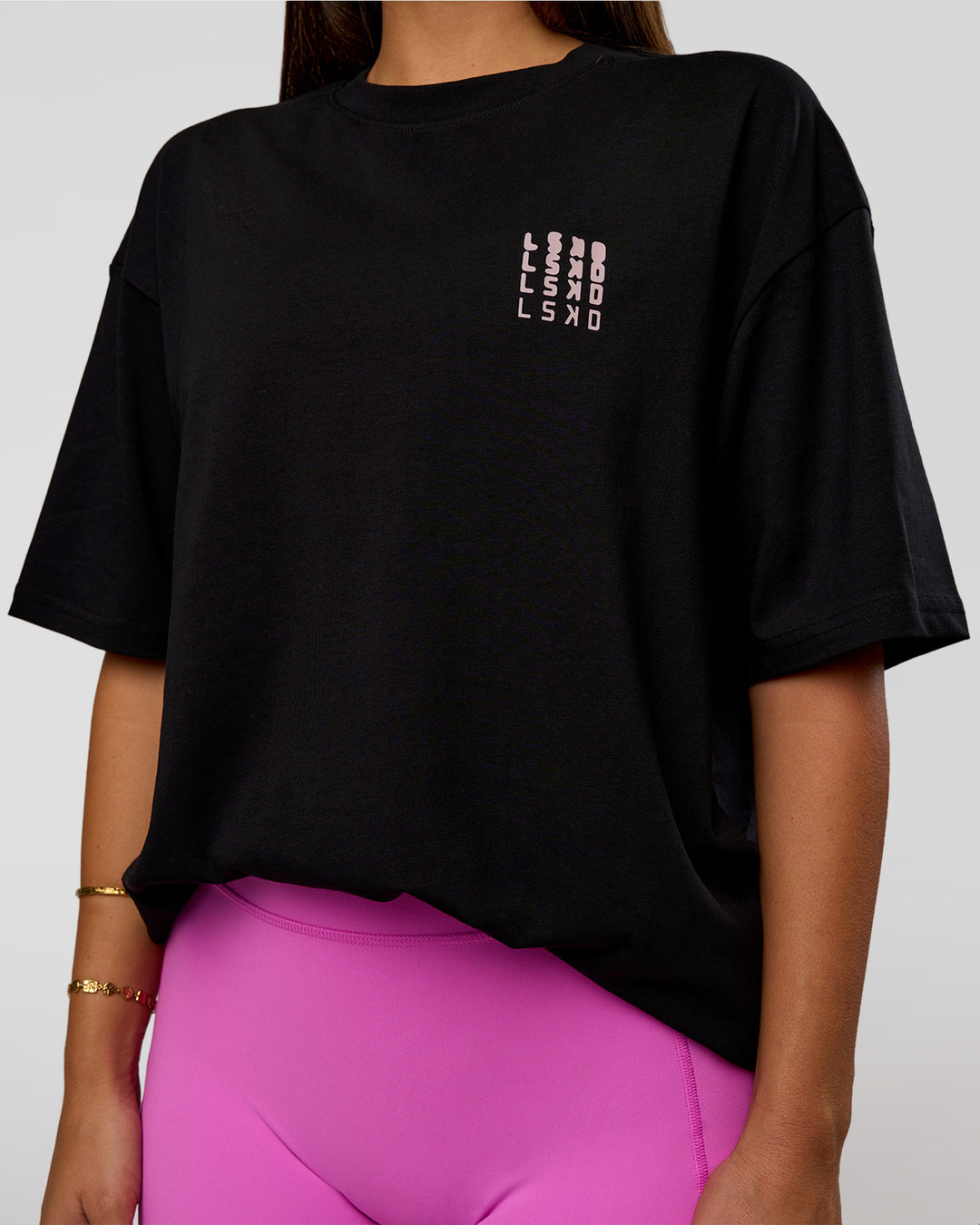 Woman wearing Inferno Journey FLXCotton Oversized Tee - Black-Ultra Fuchsia | Model:Bianca | Size:XS - view 9