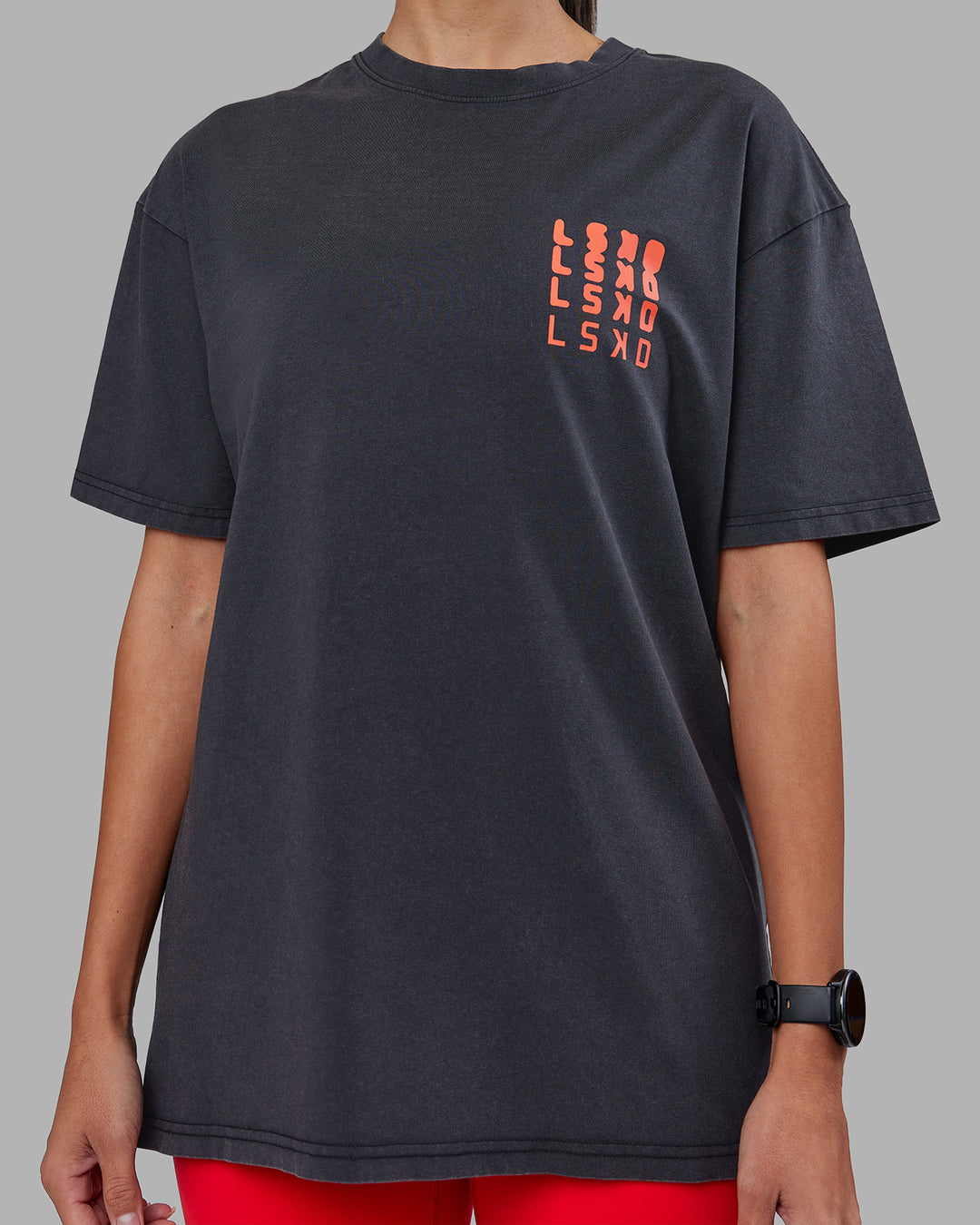 Woman wearing Inferno Journey FLXCotton Oversized Tee - Black Washed-Ultra Orange | Model:Rhiley | Size:XS - view 11