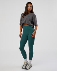 Woman wearing Inferno Journey FLXCotton Oversized Tee - Dark Storm Washed-Iceberg Green | Model:Bianca | Size:XS | Thumbnail Index: 10