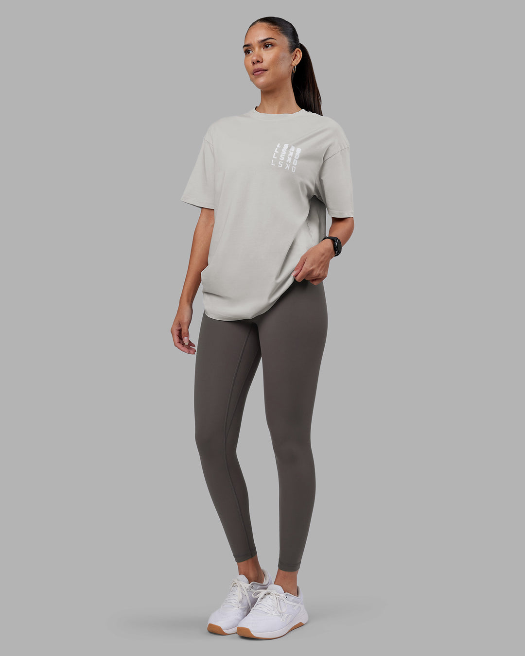 Woman wearing Inferno Journey FLXCotton Oversized Tee - Digital Mist Washed-White | Model:Rhiley | Size:XS - view 11