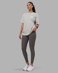 Woman wearing Inferno Journey FLXCotton Oversized Tee - Digital Mist Washed-White | Model:Rhiley | Size:XS | Thumbnail Index: 10