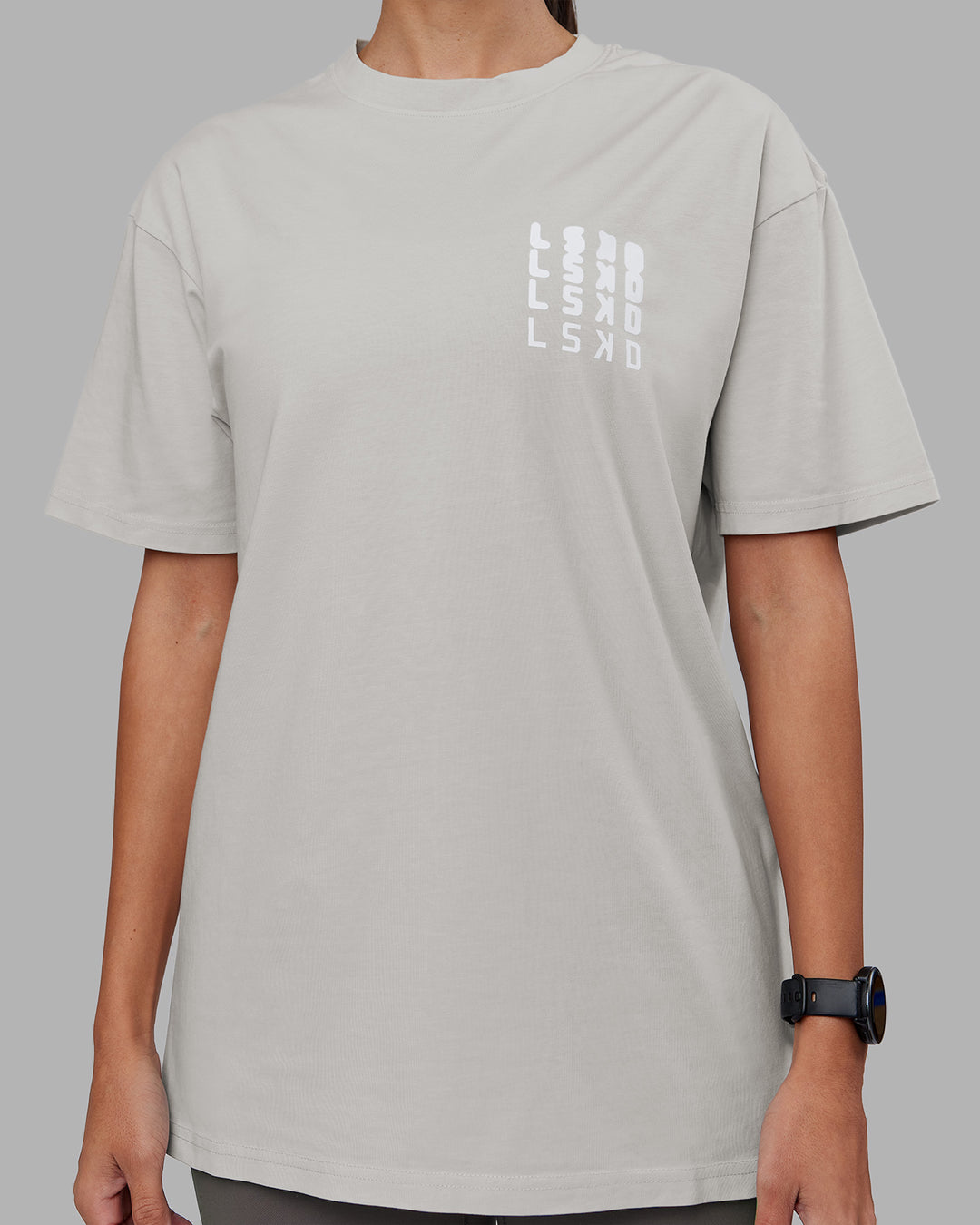 Woman wearing Inferno Journey FLXCotton Oversized Tee - Digital Mist Washed-White | Model:Rhiley | Size:XS - view 8