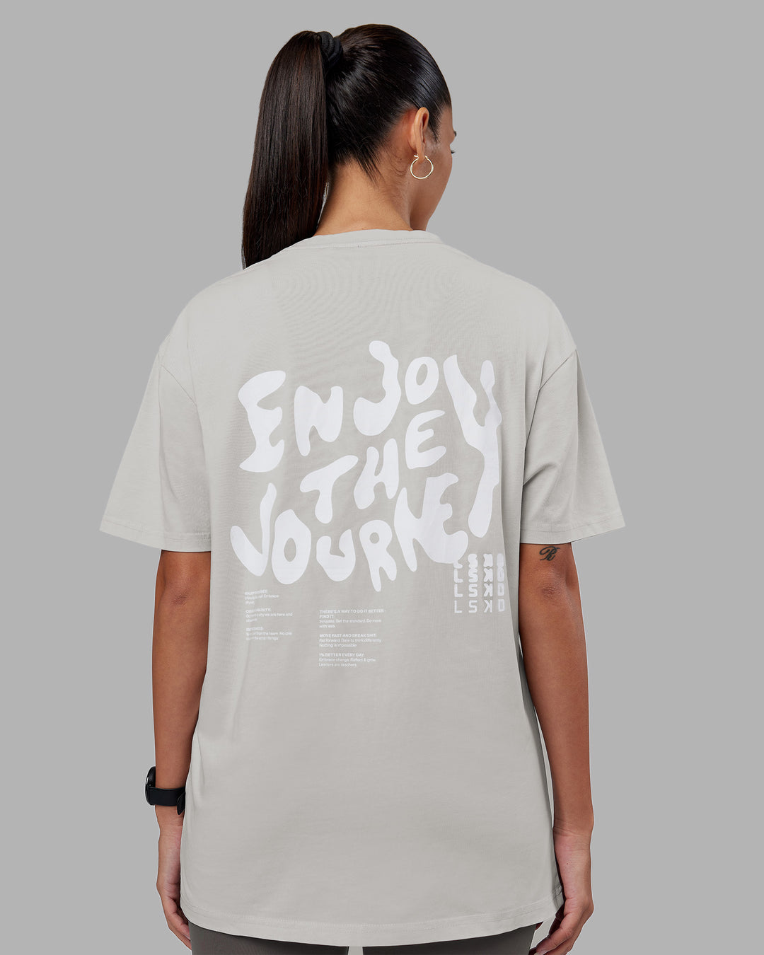 Woman wearing Inferno Journey FLXCotton Oversized Tee - Digital Mist Washed-White | Model:Rhiley | Size:XS - view 7