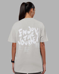 Woman wearing Inferno Journey FLXCotton Oversized Tee - Digital Mist Washed-White | Model:Rhiley | Size:XS | Thumbnail Index: 6