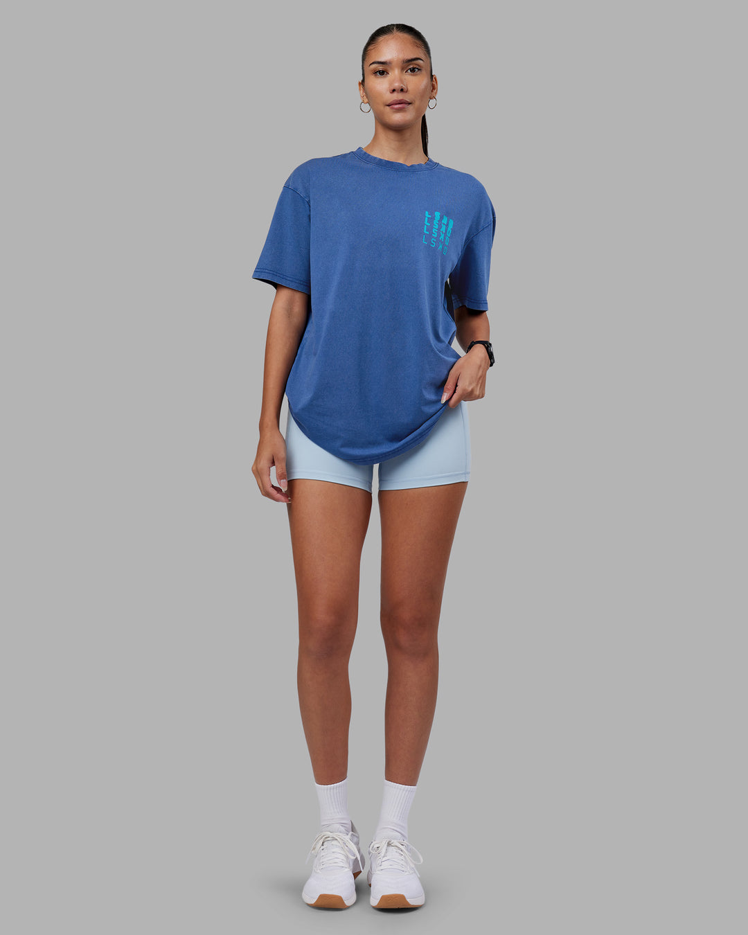 Woman wearing Inferno Journey FLXCotton Oversized Tee - Midnight Blue Washed-Blue | Model:Rhiley | Size:XS - view 5